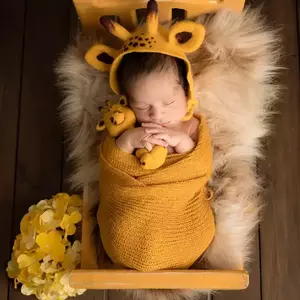 عکاسی نوزاد با دکور در آتلیه